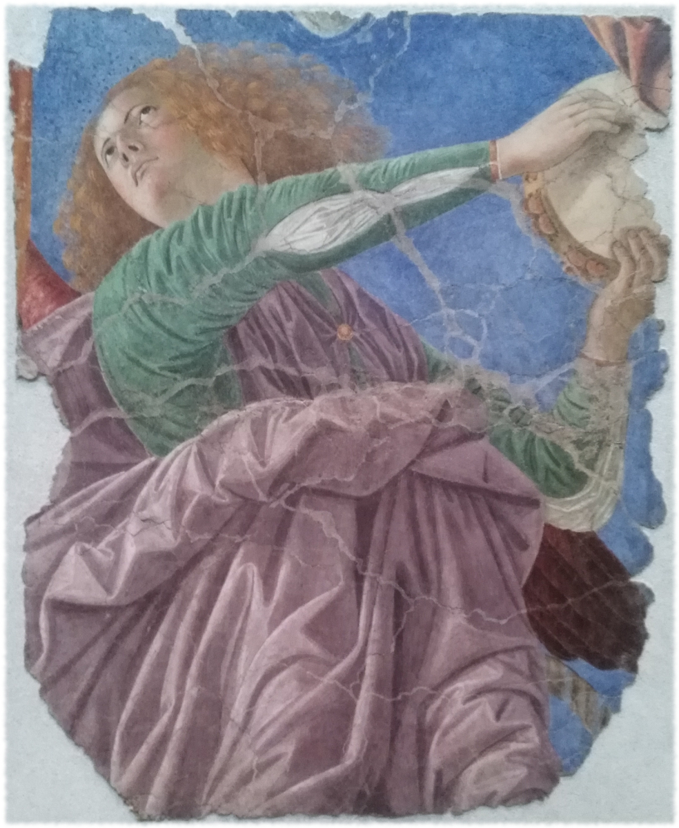 angel playing a tamborine